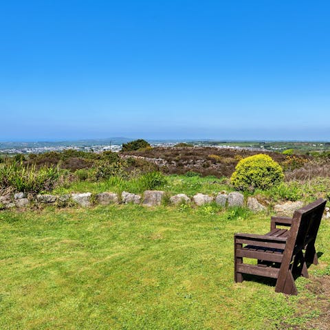 Admire the views over the Cornish countryside from the private garden