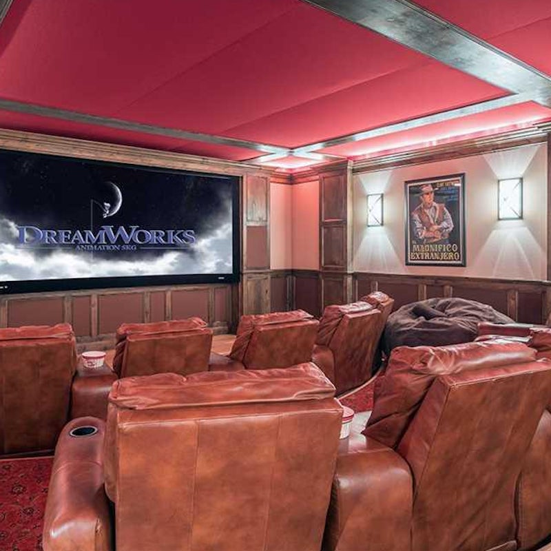 Sit back and enjoy a movie from the plush seats of the home theatre