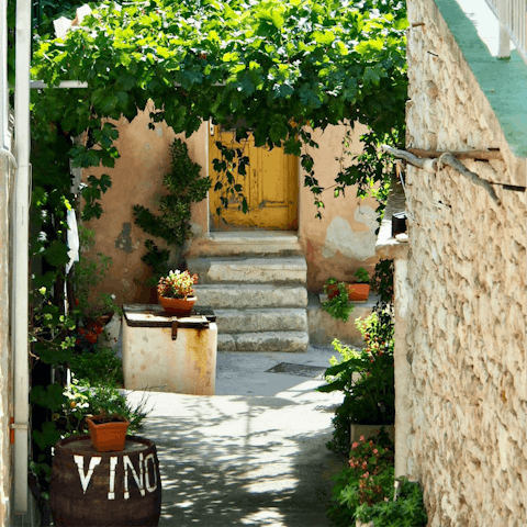 Explore the village of Primošten and find quaint narrow streets and beautiful beaches