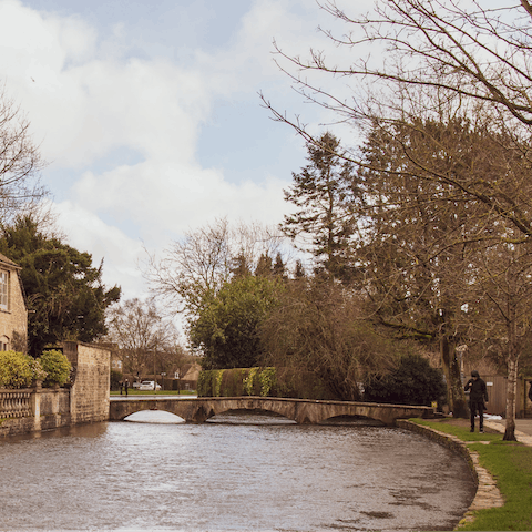 Take a morning stroll along the River Windrush, a minute's walk away