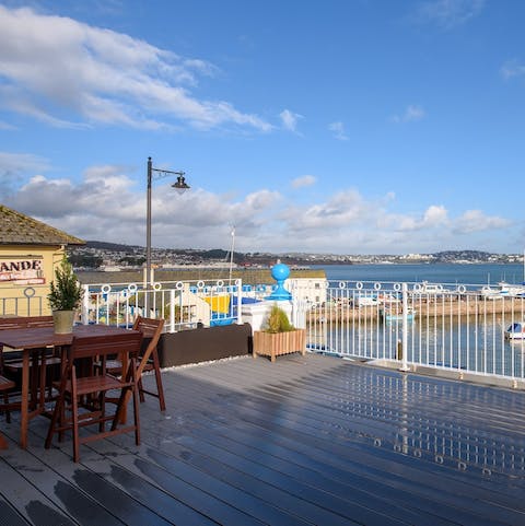 Have your morning coffee on the wooden deck and breathe in the sea air