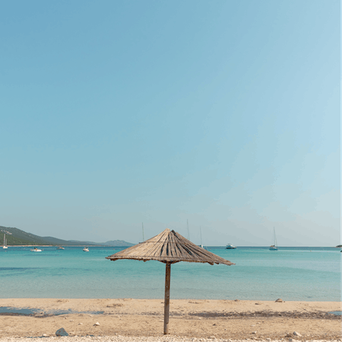 Stroll for ten minutes to Almyros Beach, where you can swim in the Ionian Sea