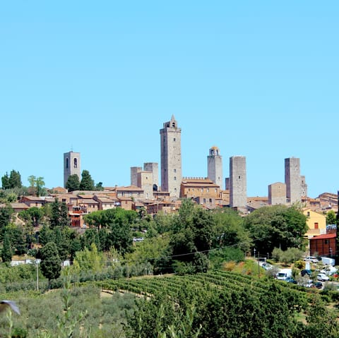 Stroll around historic San Gimignano – it's a forty-one-minute drive