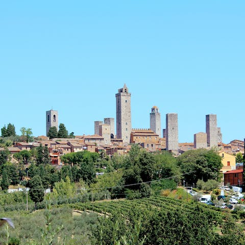 Stroll around historic San Gimignano – it's a forty-one-minute drive