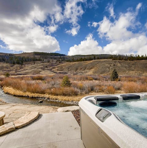 Sweep up views of the stream from the hot-tub
