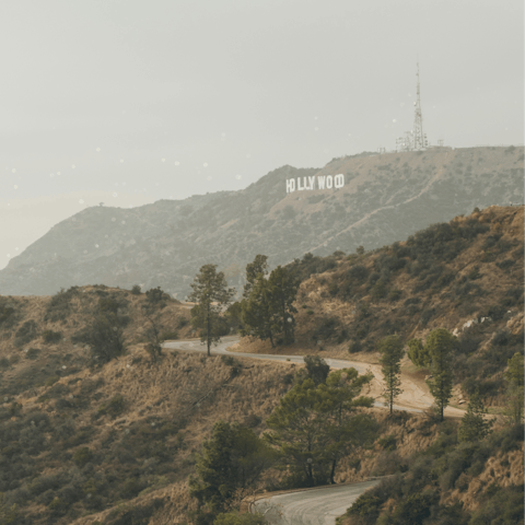 Follow hiking trails through the iconic Hollywood Hills