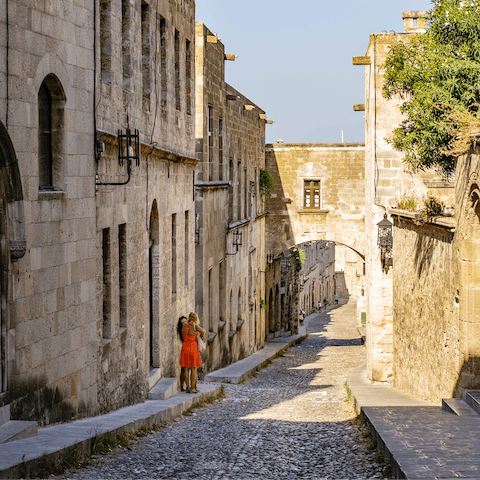 Visit the piazzas and Byzantine-era mosques in  Rhodes' old town  