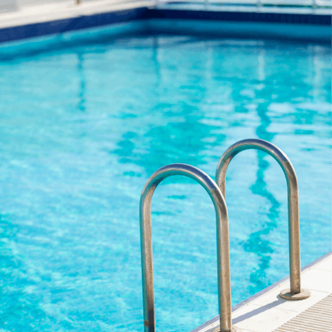 Take a refreshing dip in the shared swimming pool