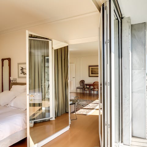 Fold back the glass doors in the bedroom for some fresh air