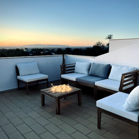 Gather on the rooftop and share drinks while admiring gorgeous views