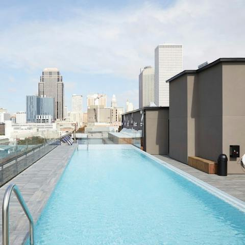 Swim above the city in the rooftop pool