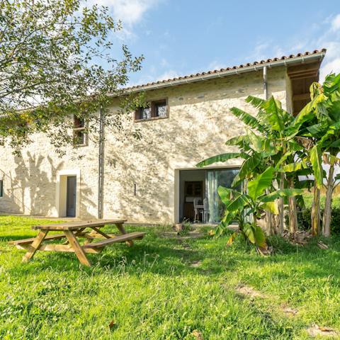 Enjoy picnic dinners in the lush garden, listening to the river