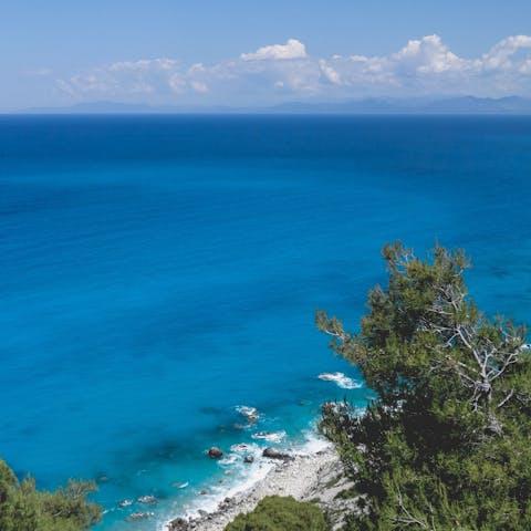 Visit Pefkoulia Beach and swim in the Ionian Sea, 3.5km away