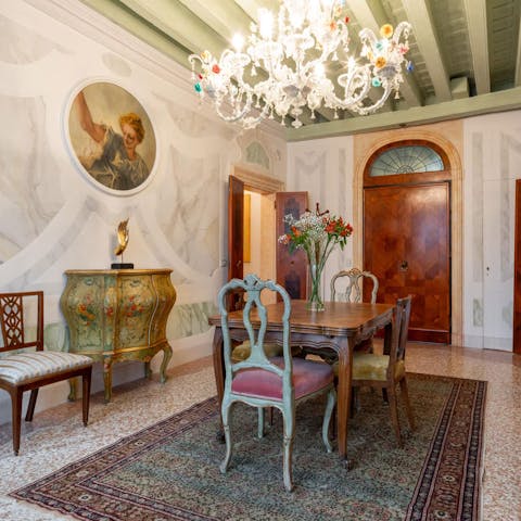 Enjoy Risi e Bisi for dinner in the ornate dining room