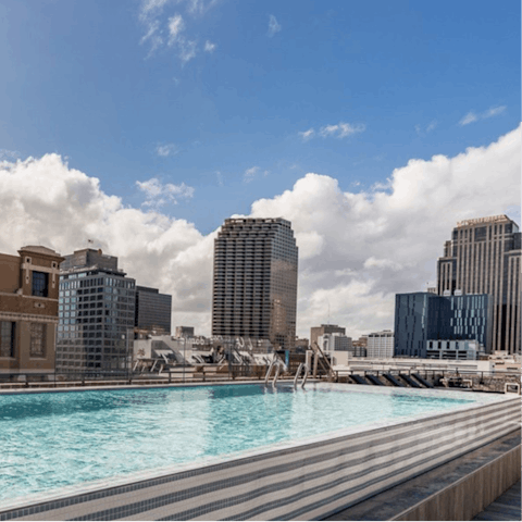 Plunge into the heated rooftop pool