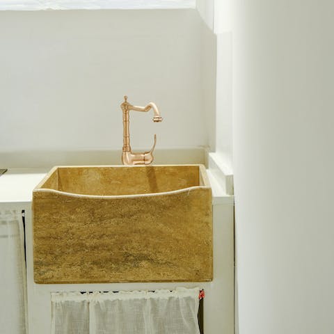 Embrace old-world charm with the sunken stone sink