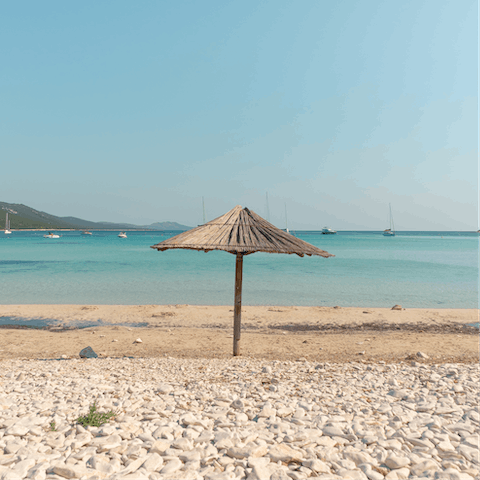 Paddle in the shallows of Casablanca Beach – it's just a few metres away