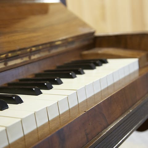 Get the family musician on the piano for an impromptu evening performance