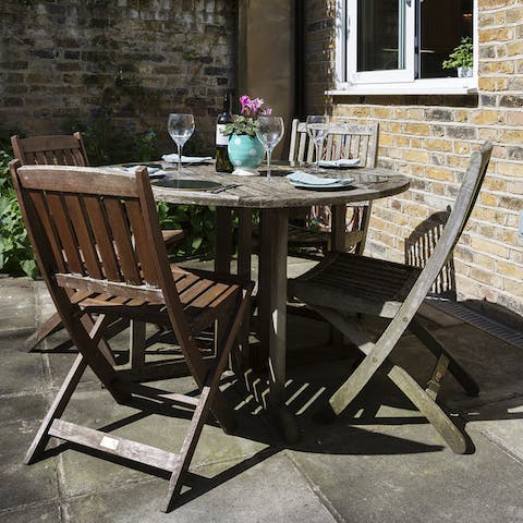 Dine alfresco on your sun-soaked patio on a balmy evening