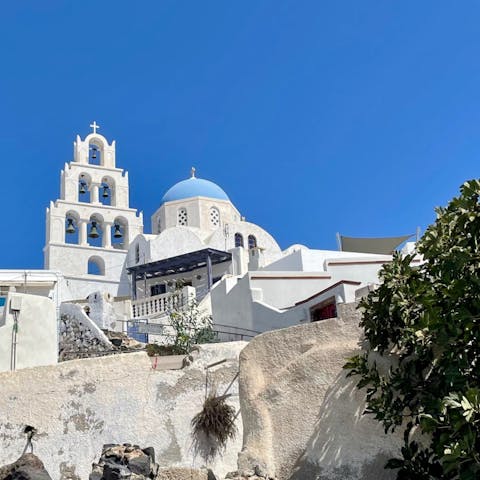 Immerse yourself in traditional island life and explore the medieval alleys of Pyrgos - a thirty-minute drive away