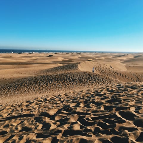 Visit the unique sand dunes of Maspalomas, just a three-minute drive away