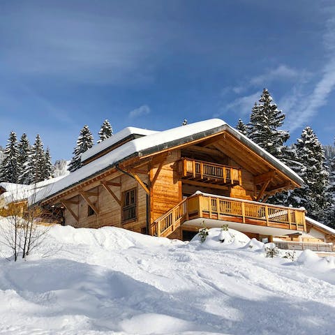 Stay in a traditional ski chalet in the heart of the Swiss Alps, with stunning views everywhere you look