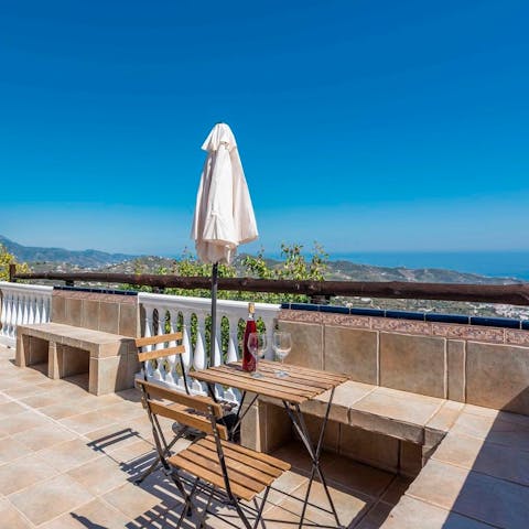 Sip sangria from your terrace, overlooking the Mediterranean vistas