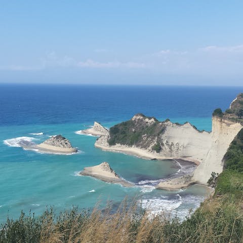 Explore the long sandy beaches and traditional tavernas of Corfu