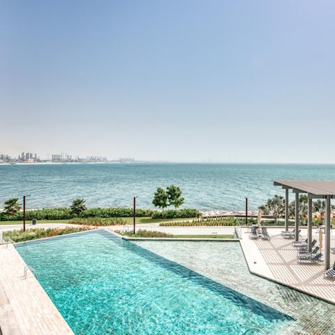 Swim lengths and take in the view from the communal pool