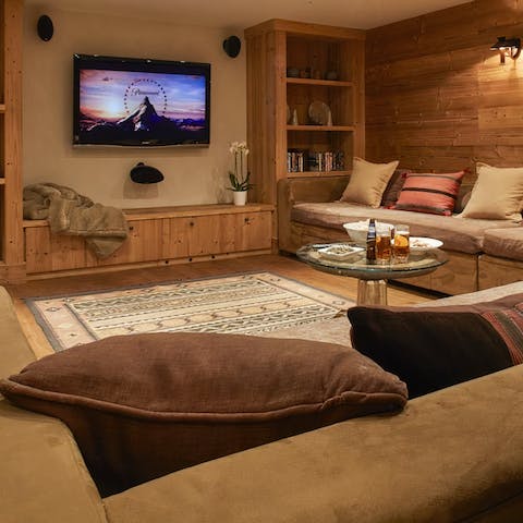 Snuggle up in the home movie theatre room 