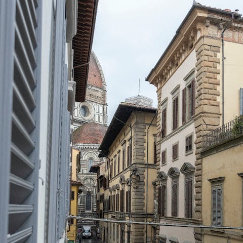 Steal a glimpse of the Duomo from the apartment's window