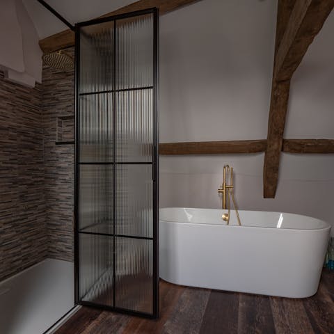Sink into a hot bath in the en-suite standalone tub after a busy day