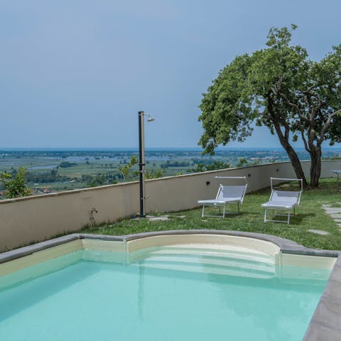 Enjoy stunning countryside views from beside the private pool