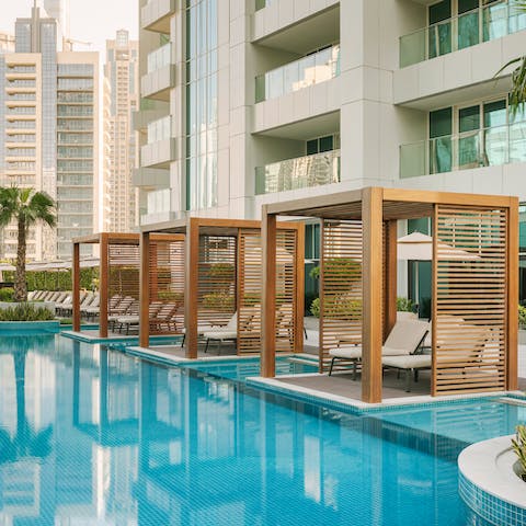 Take some time out to relax by the communal pool