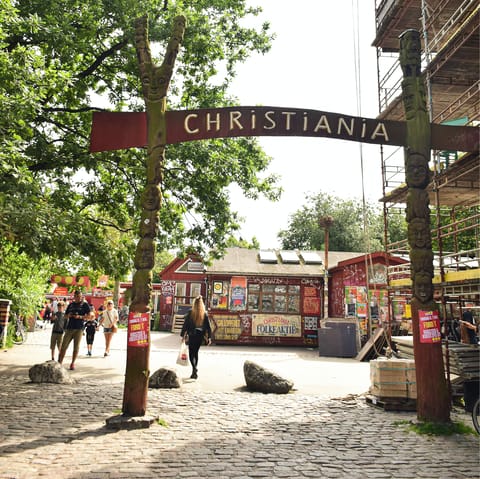 Visit the hippie haven of Christiania, where you'll find self-built homes lining the lake and atmosphere unlike anywhere else in the city