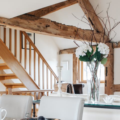 Enjoy modern amenities among striking original wooden beams