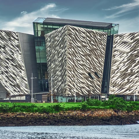Visit the iconic Titanic Belfast museum, a fifteen-minute drive away