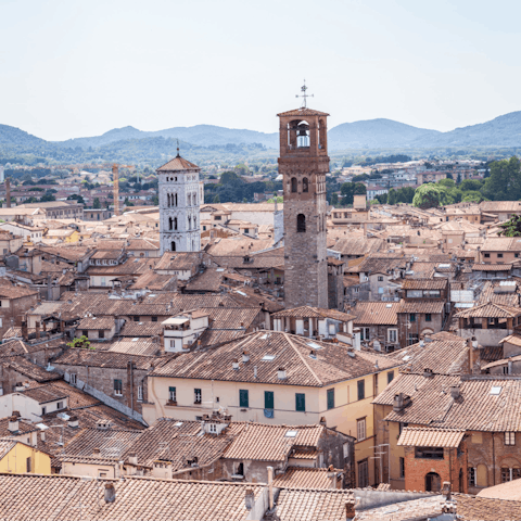 Walk the cobblestone streets of Lucca, just a thirty-five minute drive away