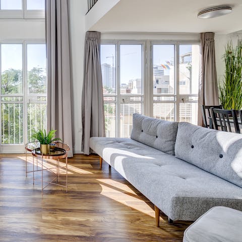 Take a moment to enjoy the serenity of your bright living space before exploring Tel Aviv