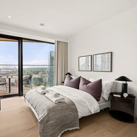 Wake up and admire the impressive city views from bed
