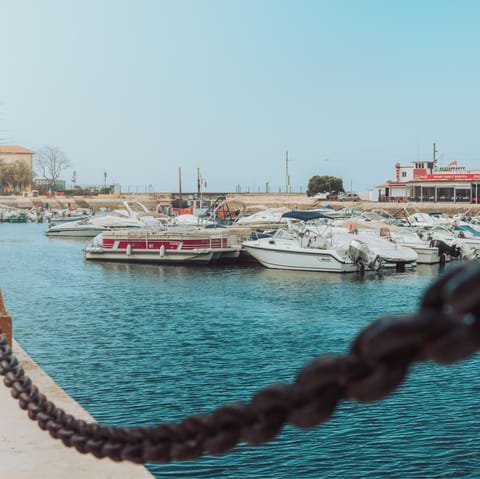 Catch a ferry to the beach from the Faro Marina, a short walk away