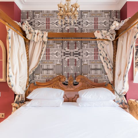 Wake up feeling well-rested in the opulent, four-posted bed