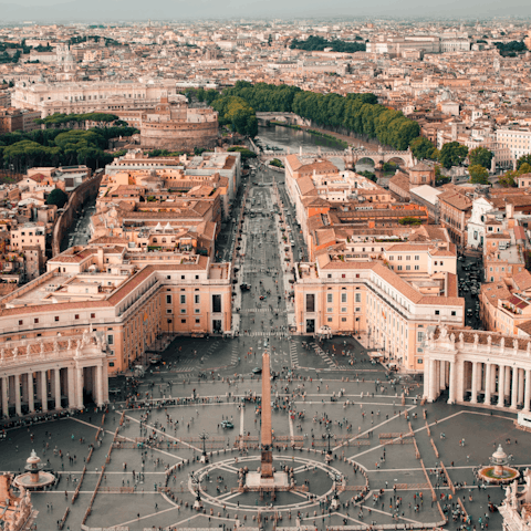 Visit St. Peter's Basilica in the Vatican City, a twenty-minute walk away