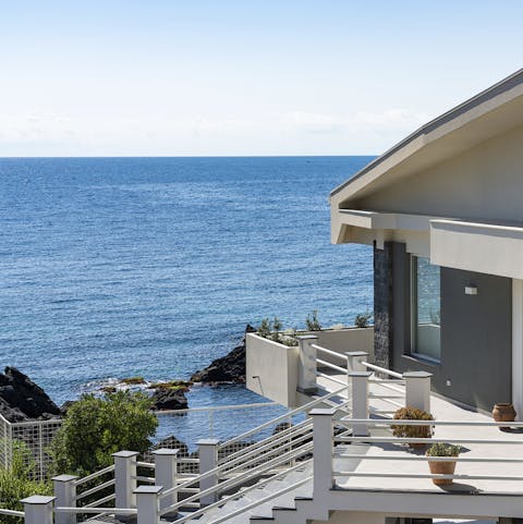 Slip into the sea from your private staircase