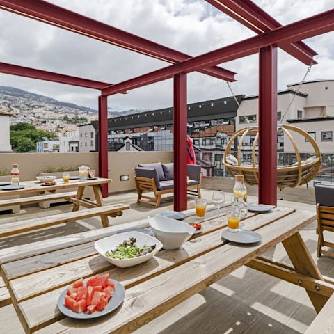 Get together for sunny breakfasts on the communal rooftop terrace