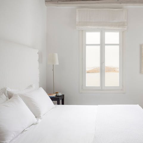 Wake up to incredible Aegean vistas from the main bedroom