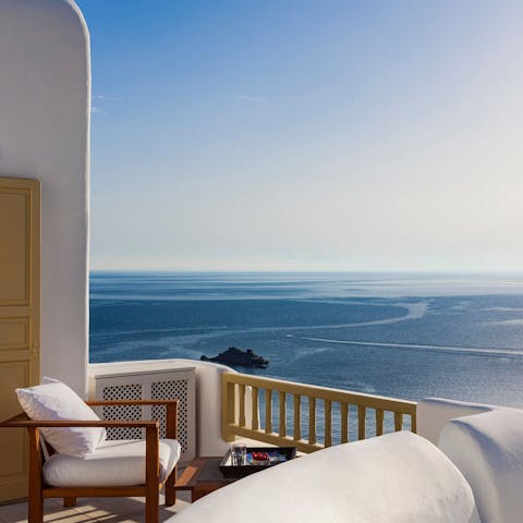 Sip your morning coffee while taking in sea views from the main bedroom's balcony
