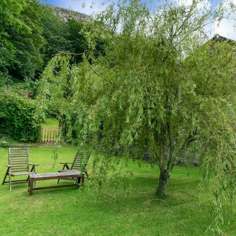 Savour your morning coffee in the lush private garden