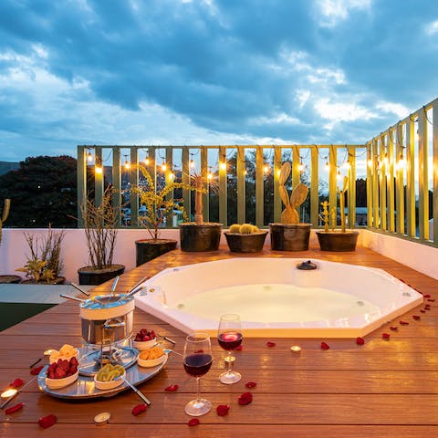 Admire the scenery from the private hot tub