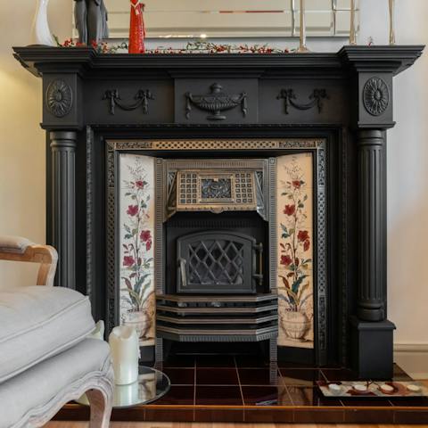 Spend rainy days snuggled up by the ornate fireplace